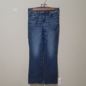AMERICAN EAGLE BOOT CUT SIZE 2 WOMEN'S FADED JEANS IN VERY GOOD CONDITION .
